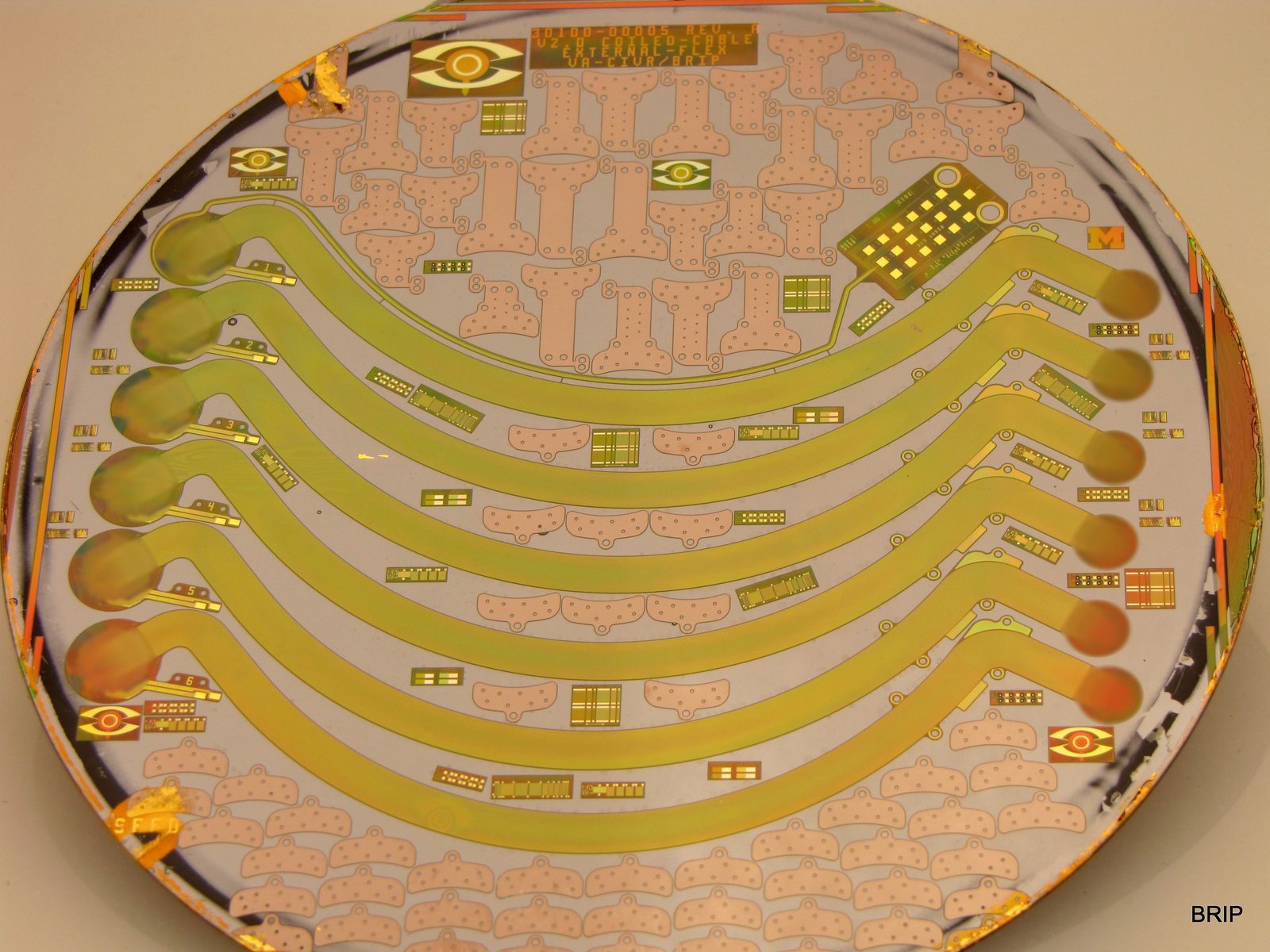 Wafer of flexible microelectrode array devices